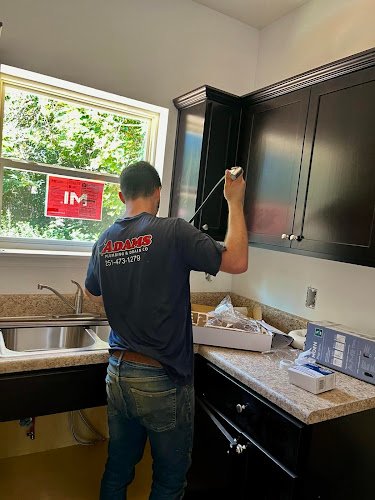 38059 adams plumbing drain company 1