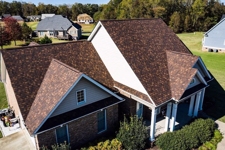 256180 guy roofing inc