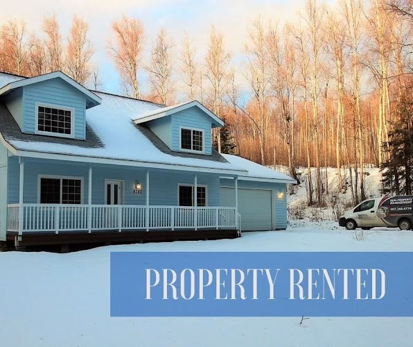 330703 real property management last frontier